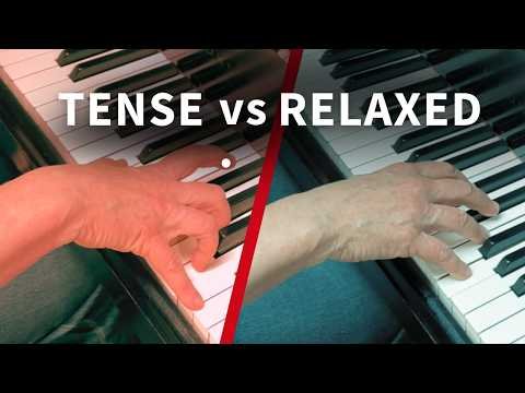 Rebecca Bogart demonstrating a hand-tension fix at the piano